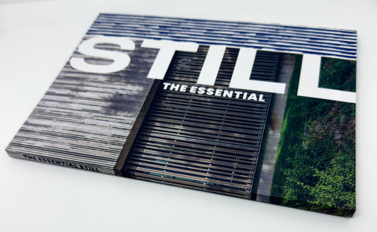Book titled 'STILL: The Essential' on a white background