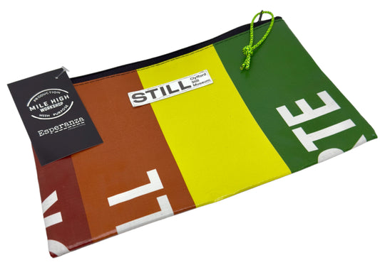 Colorful pouch with 'STILL' branding