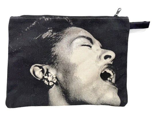 Pouch with a black and white graphic of a woman's face singing on a white background
