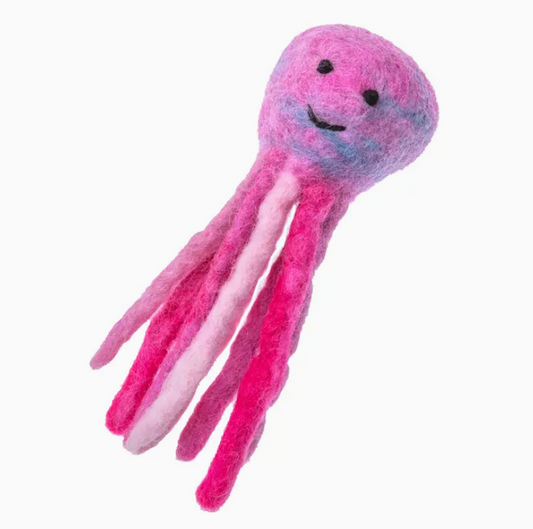 Pink plush octopus toy on a white background