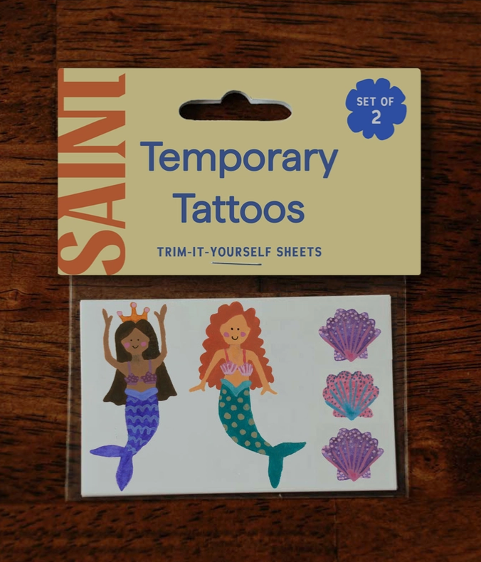 Set of temporary tattoos of mermaids and seashells