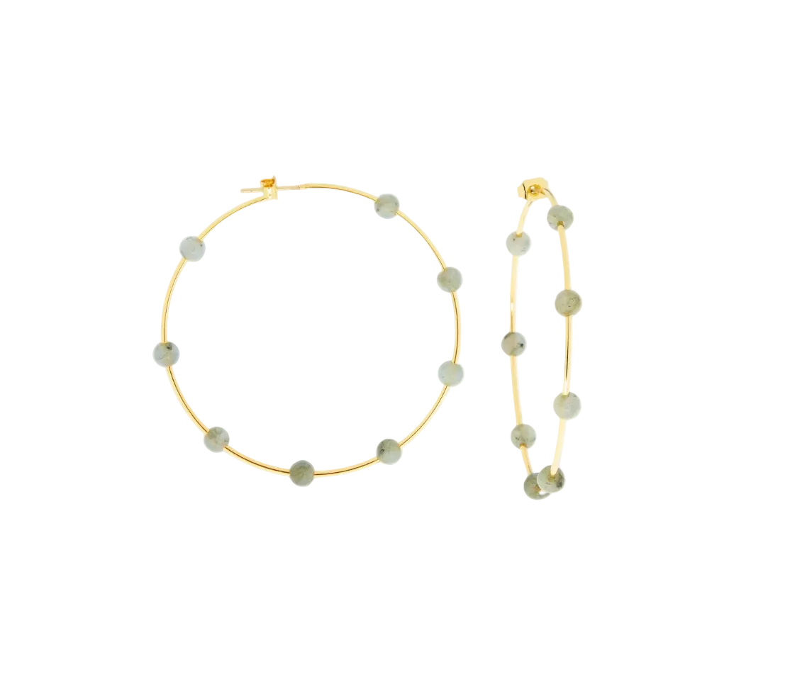 Gold hoop earrings with small round grayish stone accents, displayed on a clean white background.