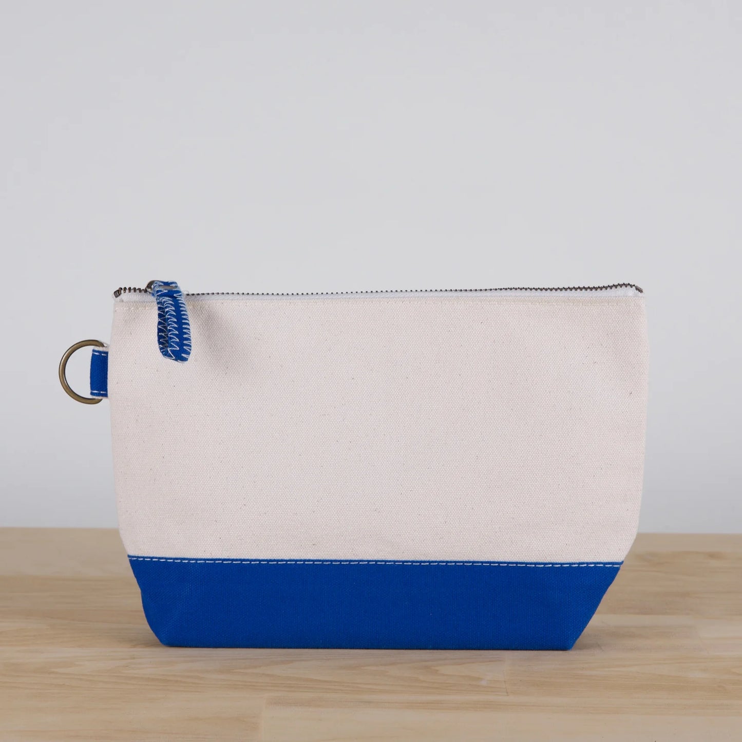 Back of Cobalt All In Zip Top Pouch.