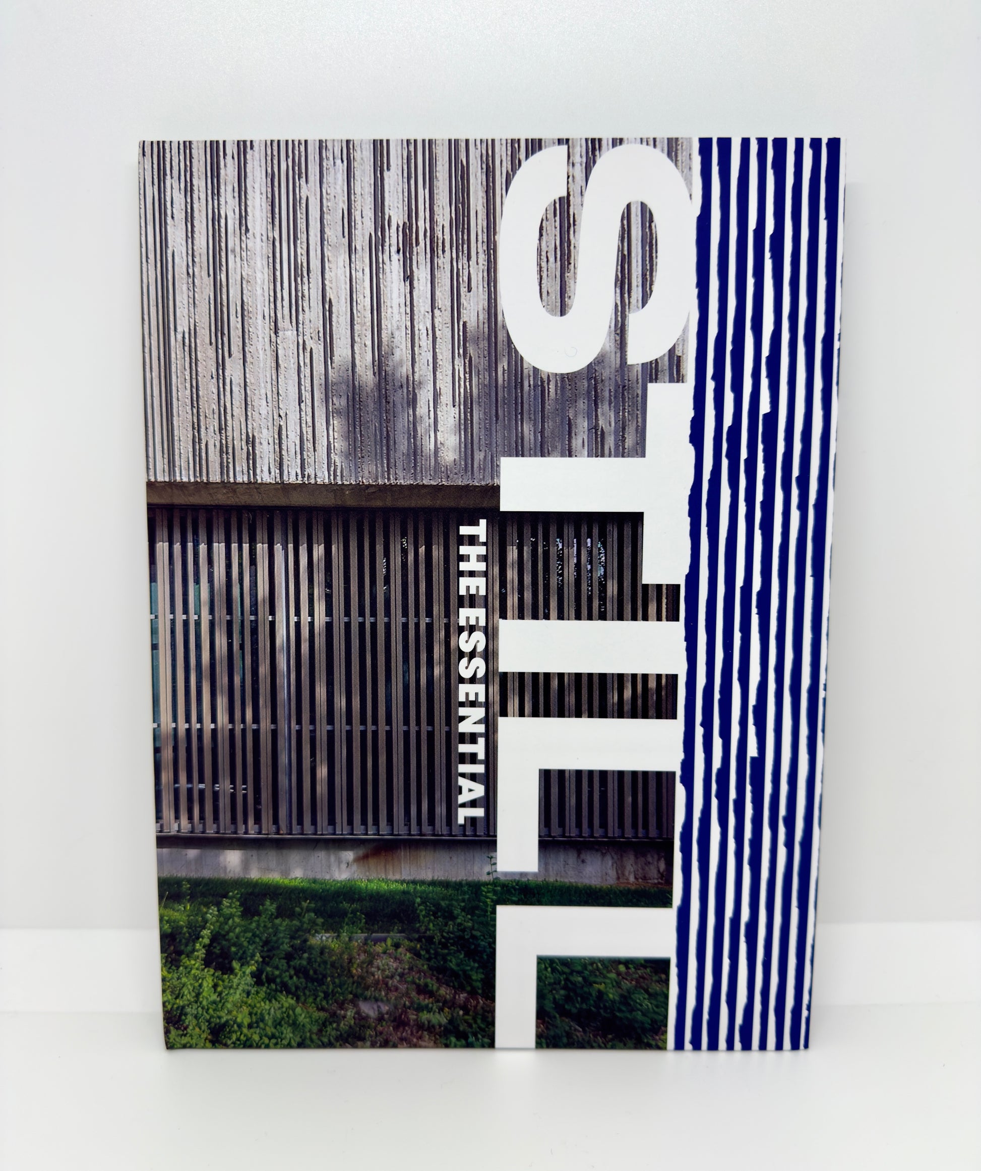 Book cover with text and images on a white background