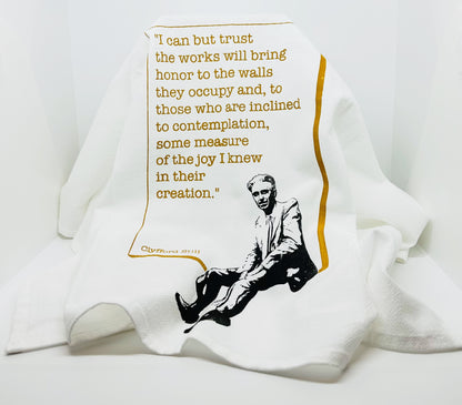 White dish towel with the quote “ I can but trust the works will bring honor to the walls they occupy and, to those who are inclined to contemplation, some measure of the the joy I knew in their creation.” And a black and white graphic of Clyfford Still.