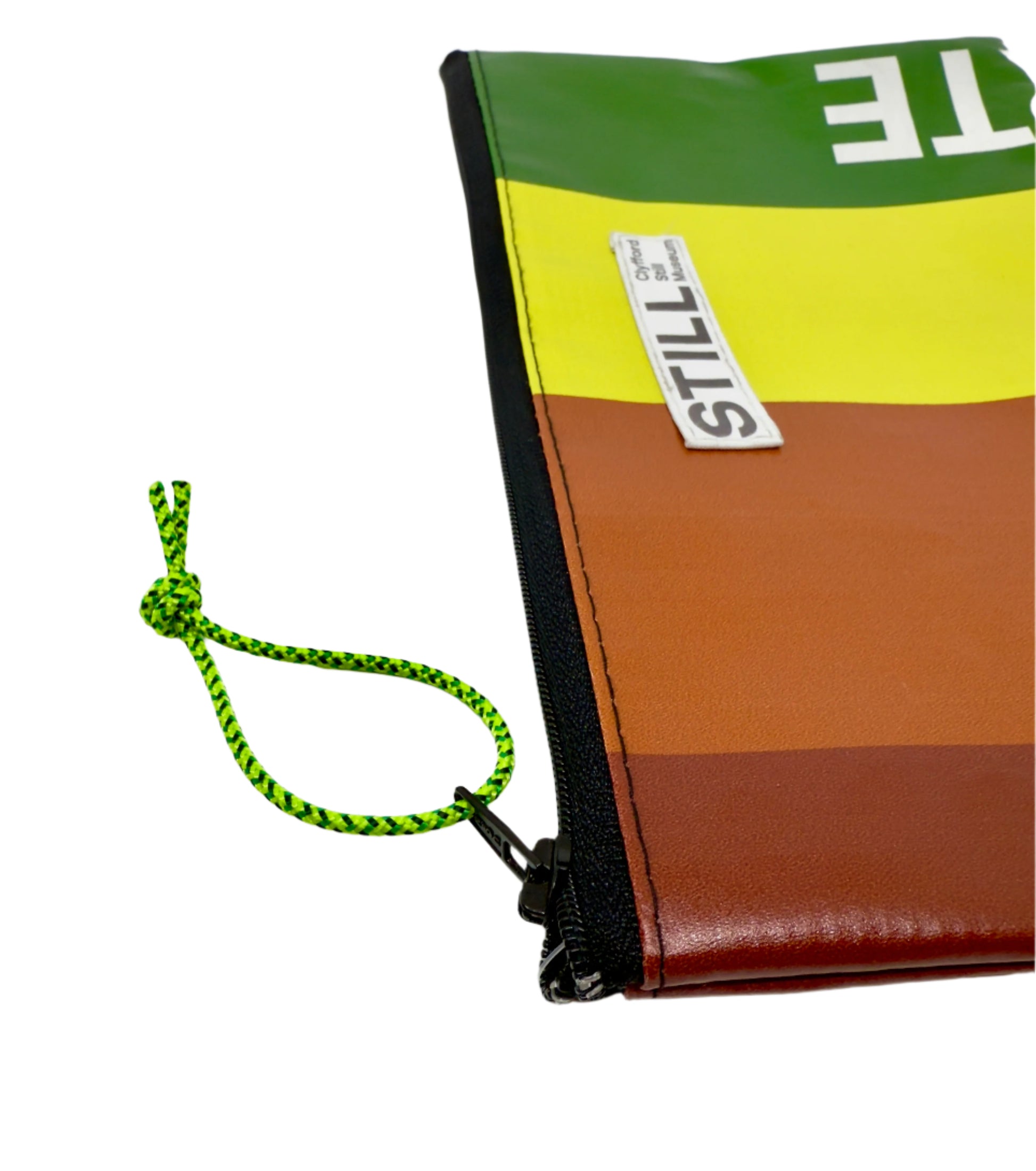 Colorful pouch with 'STILL' branding