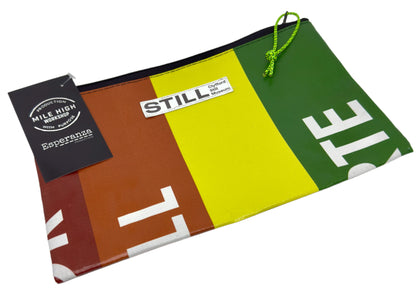 Colorful pouch with 'STILL' branding
