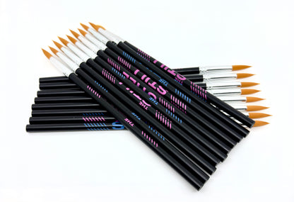 Multiple "The Still" branded pencils with paint brushes on one end