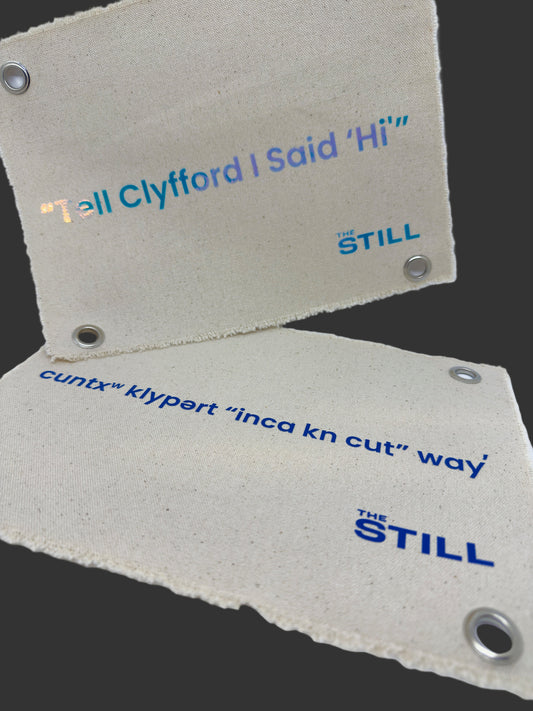 Canvas banner with "Tell Clyfford I Said 'Hi" text in English and Okanogan