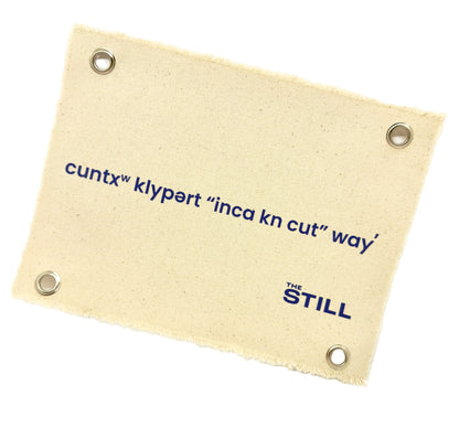 Canvas banner with "Tell Clyfford I Said 'Hi" text in Okanogan