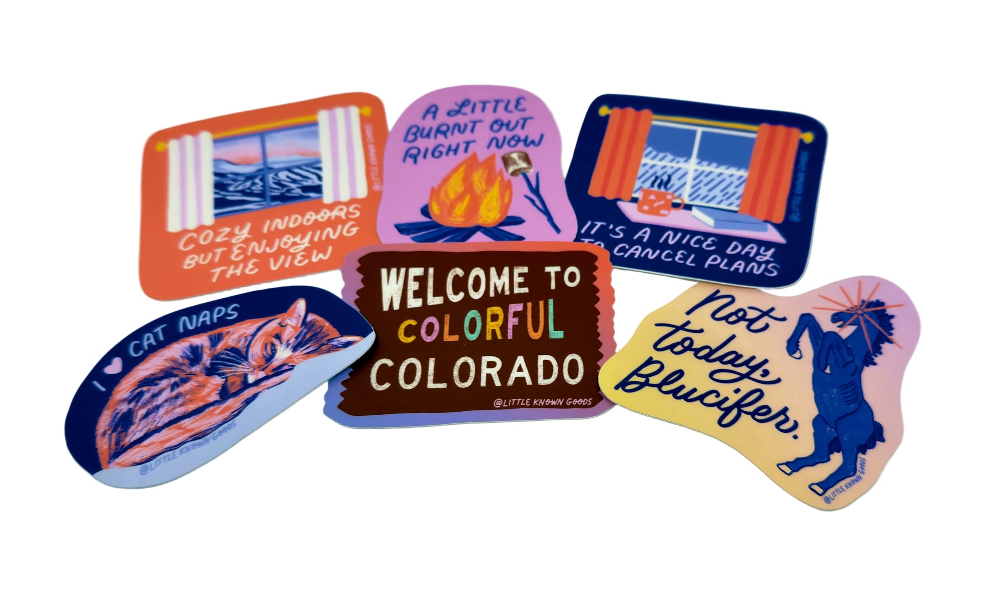 Collection of colorful stickers with various designs on a white background