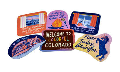 Collection of colorful stickers with various designs on a white background