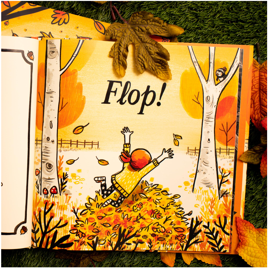 Illustrated page of a child jumping into leaves from “It’s Fall!”