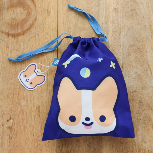 A travel-friendly, cute, versatile drawstring pouch bag with a Corgi.
