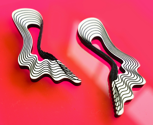 Trippy Moiré Oyster earrings will express your bold and unapologetic.