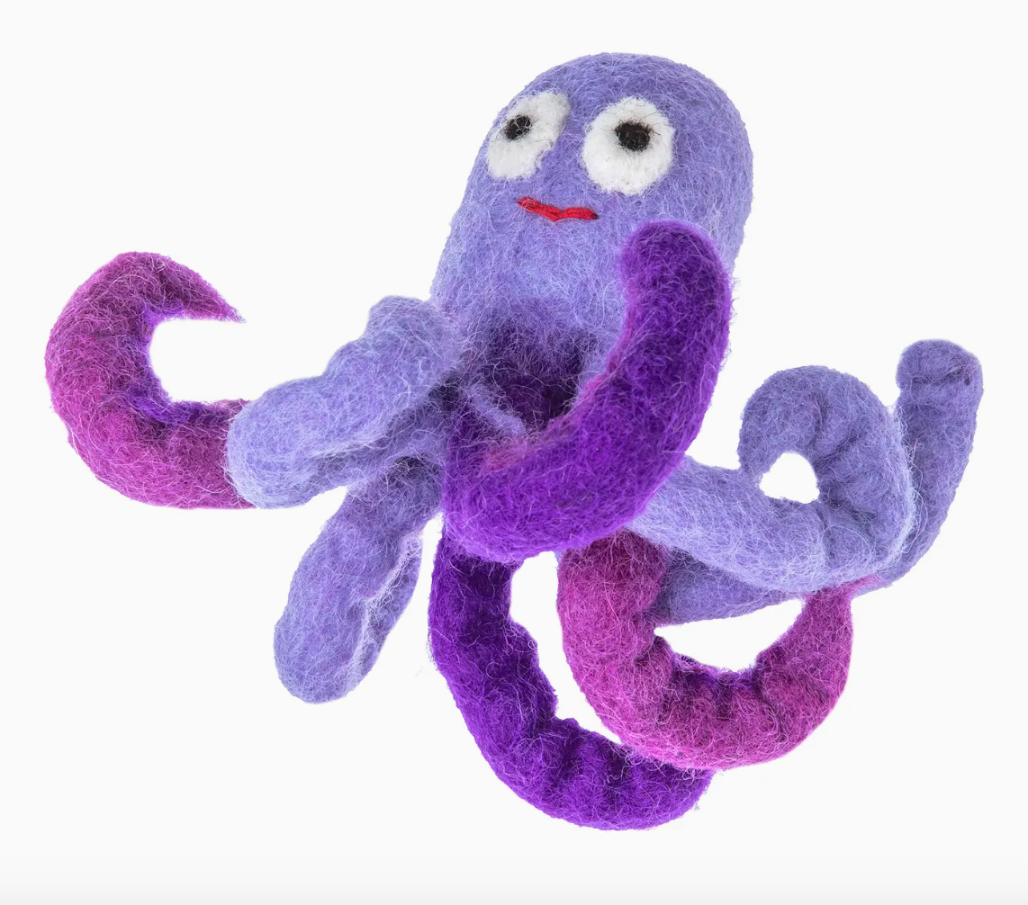 Purple plush octopus toy on a white background