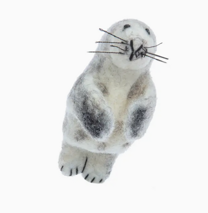Plush toy seal on a white background