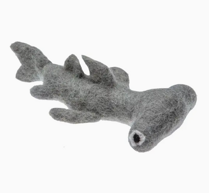 Gray shark-shaped toy on a white background