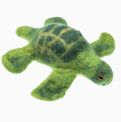 Green turtle plush toy on a white background