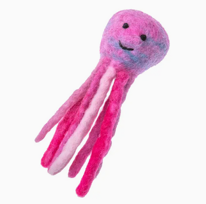 Pink plush octopus toy on a white background