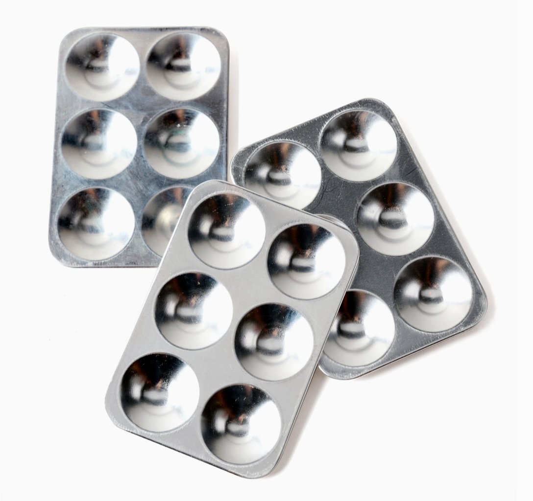 Three aluminum paint palettes