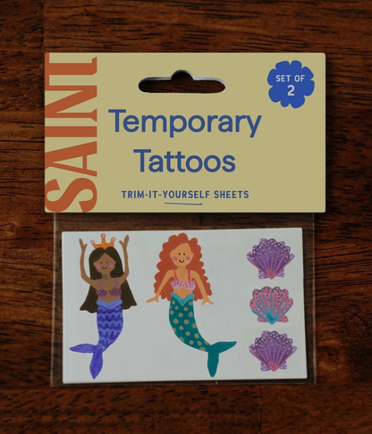 Set of temporary tattoos of mermaids and seashells 