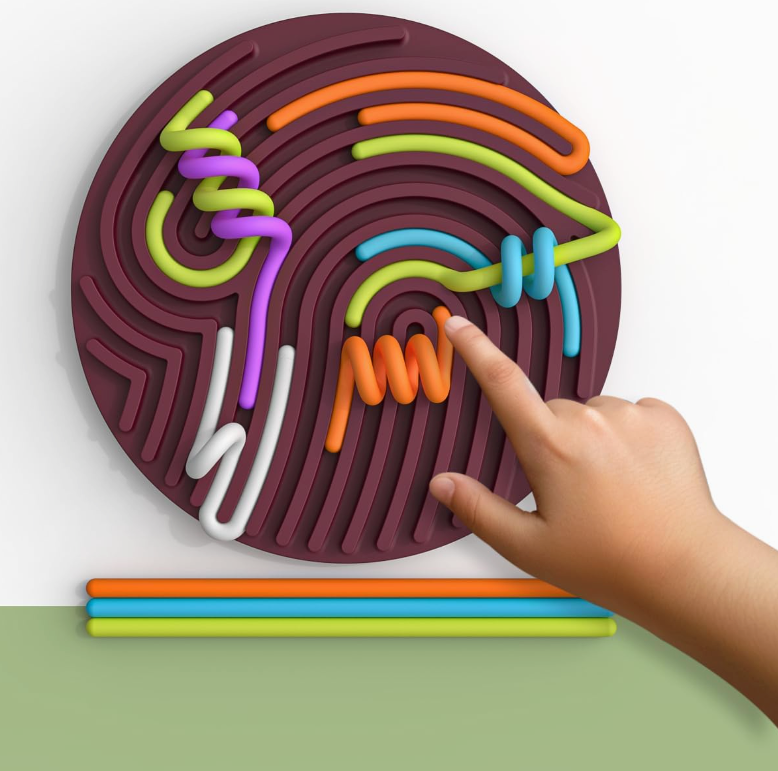 Silicone mat with colorful strips and a hand interacting with it on a white background.
