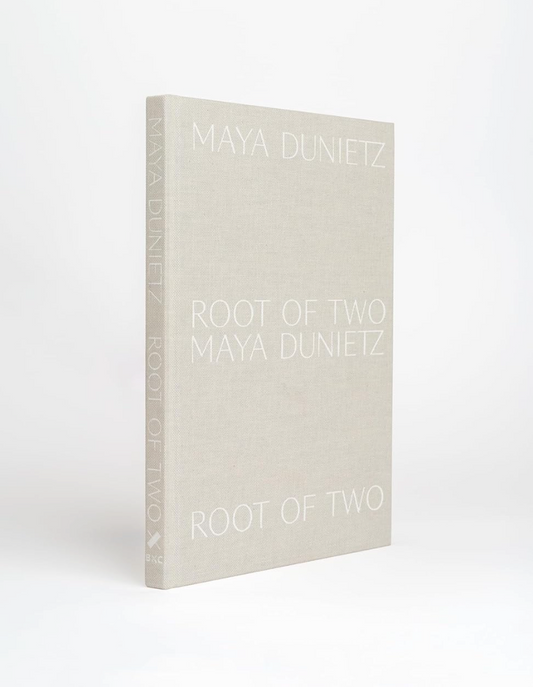 Book titled 'Root of Two' by Maya Dunietz on a white background