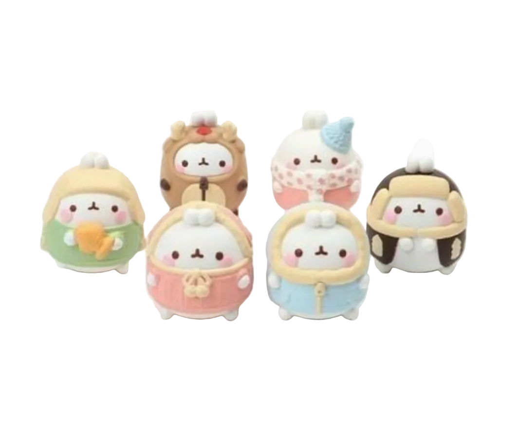 Set of cute toys with various animal-themed designs on a white background.