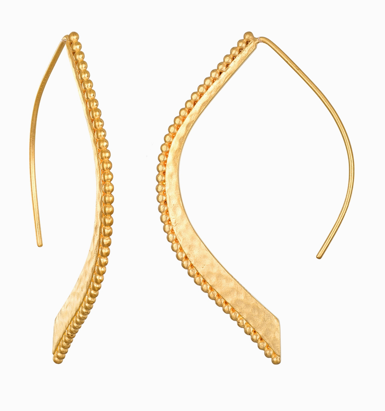 Gold hoop earrings with beaded detailing on a white background
