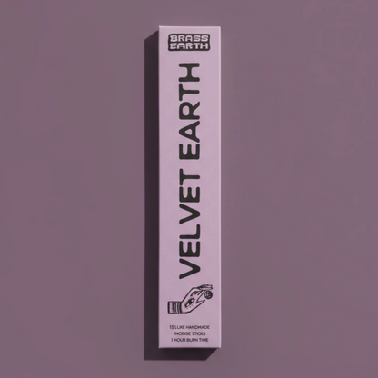 Velvet Earth Incense product packaging on a purple background