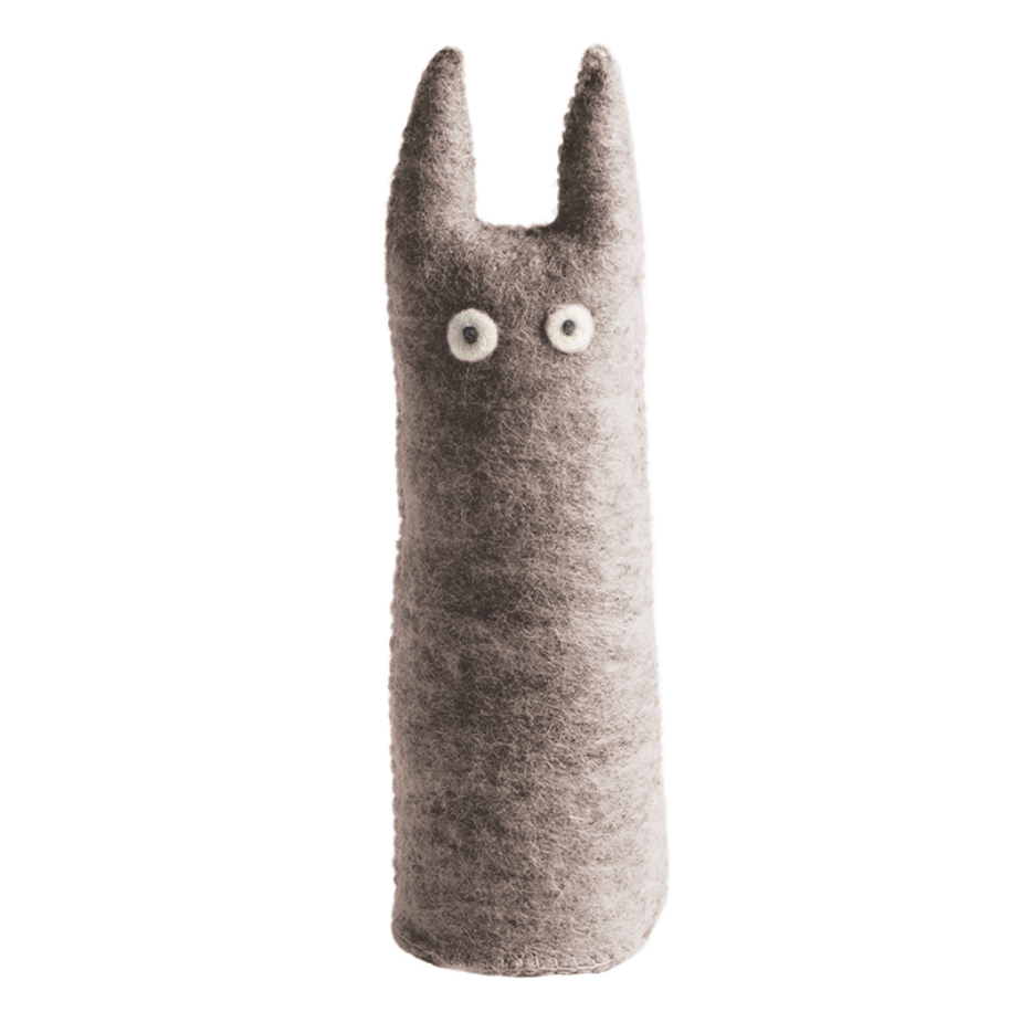 Gray plush figure with a cat-like face on a white background