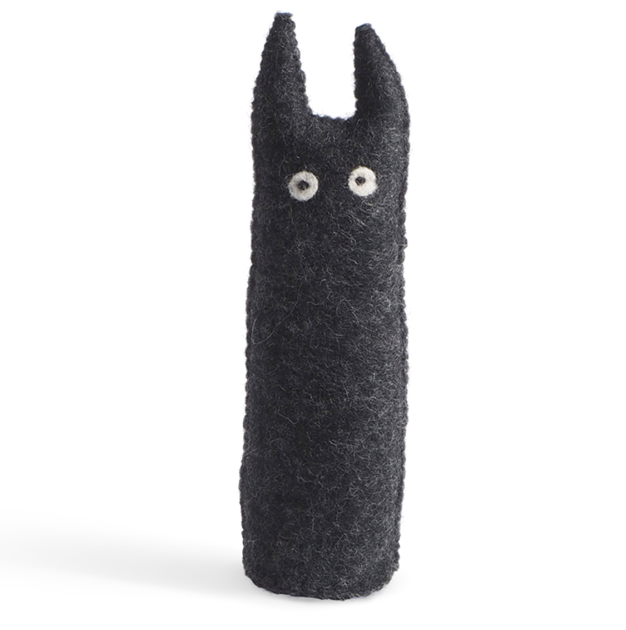 Black plush figure with a minimalist design on a white background