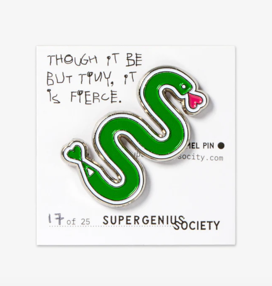 Green snake-shaped enamel pin with 'Supergenius Society' branding on a white card.