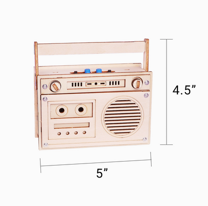 Wooden toy boombox with dimensions on a white background