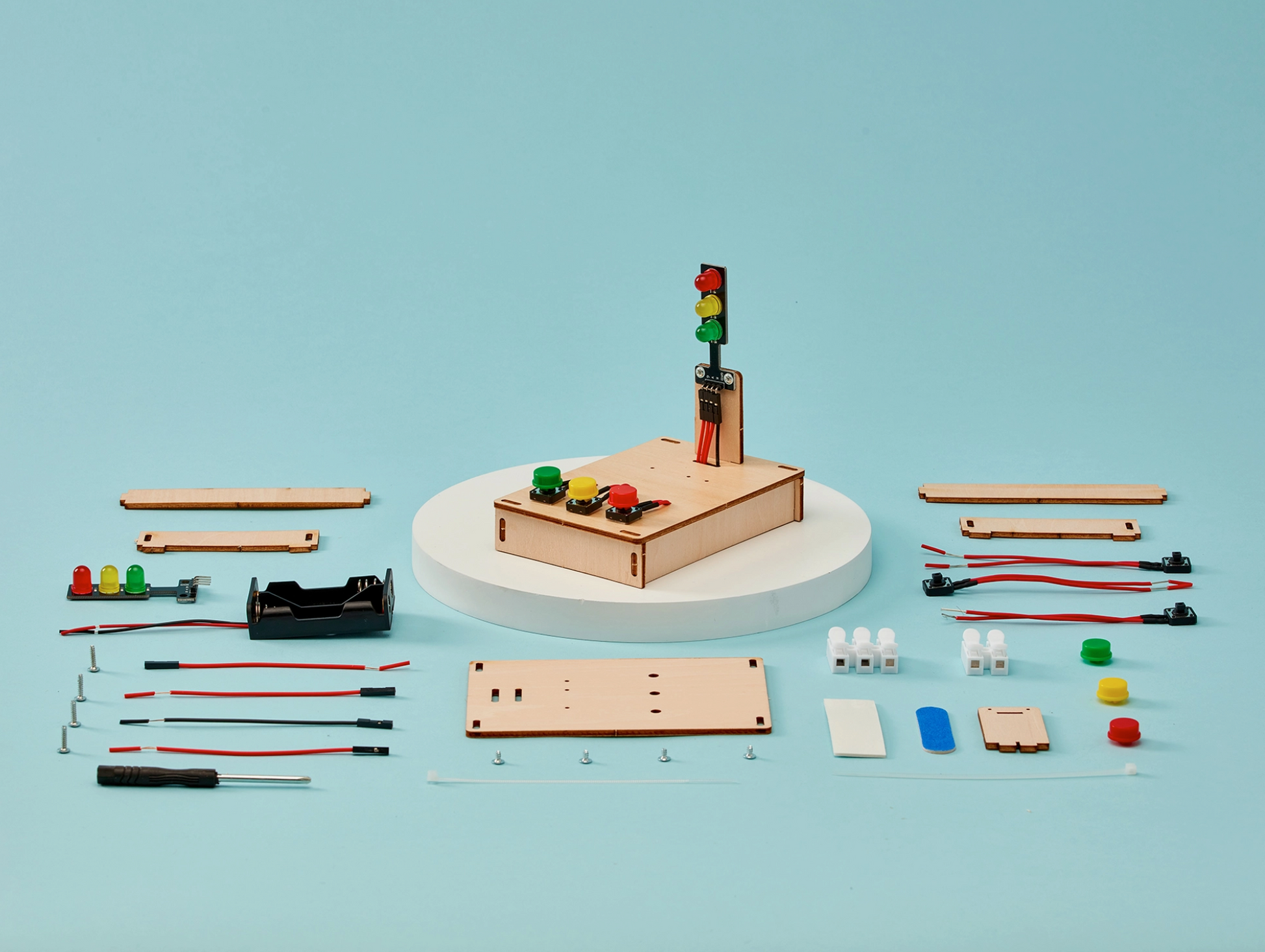 Model traffic light set on a blue background and all its parts.