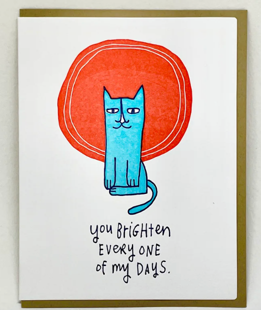 Card with a blue cat illustration and text on a white background