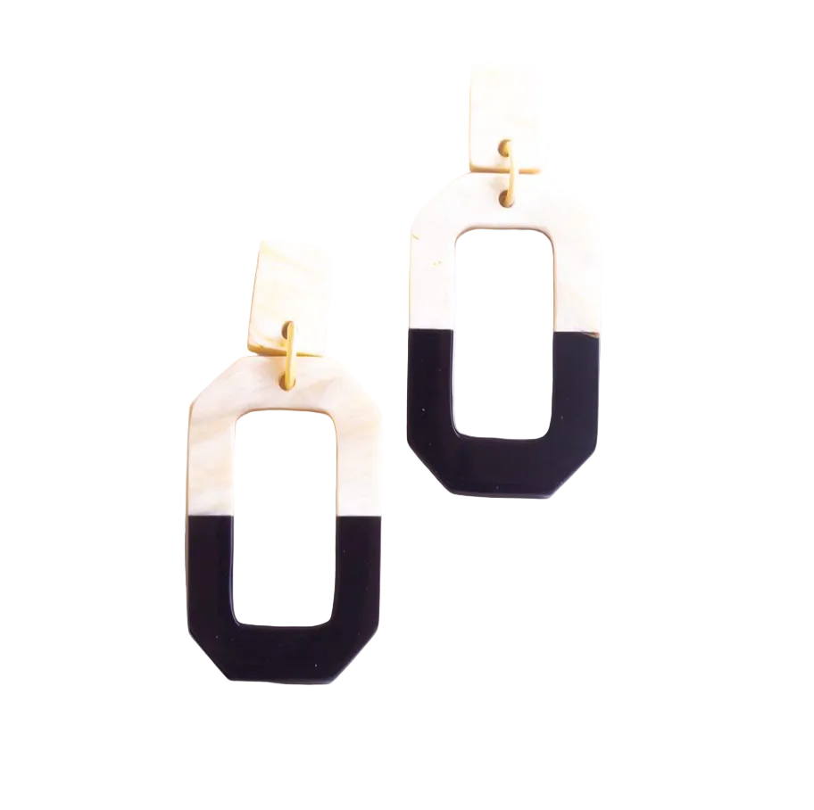 Pair of earrings with black and beige rectangular shapes on a white background