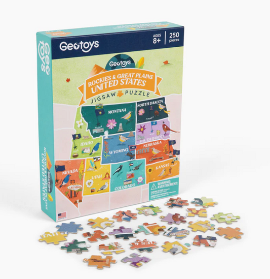 Geotoys jigsaw puzzle box with puzzle pieces on a white background