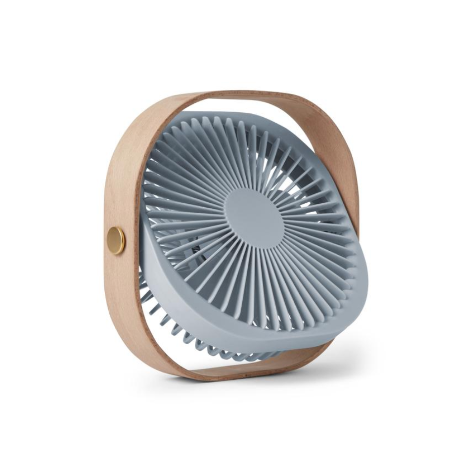 A portable circular fan with a light gray ribbed face, a natural wood handle, and a small gold button, shown on a white background.