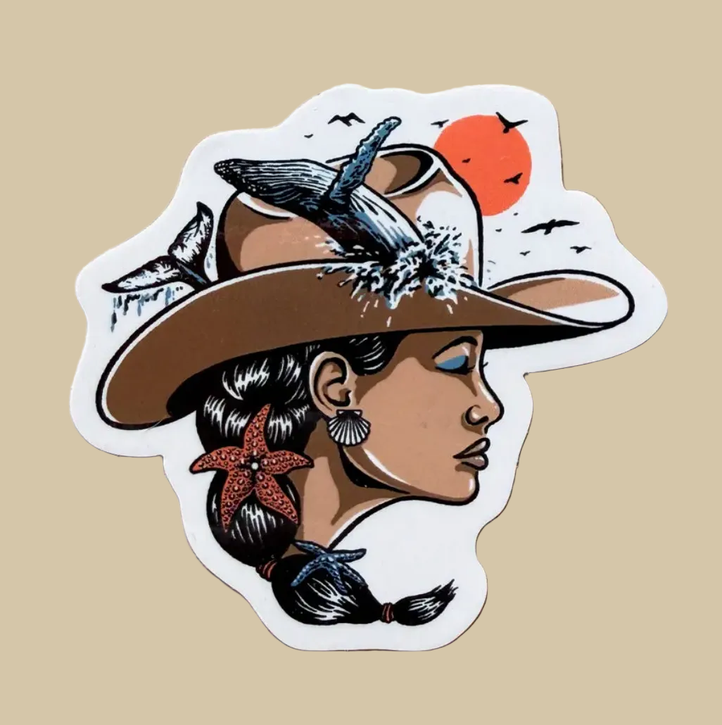 A die-cut sticker featuring an illustrated profile of a woman wearing a brown cowboy hat with a blue bird on it, set against a tan background with a red sun and birds.