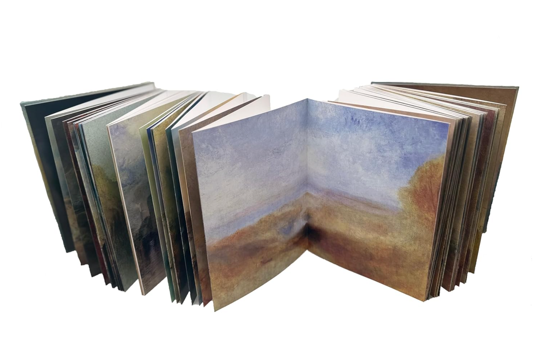 Open book displaying a landscape painting on a white background