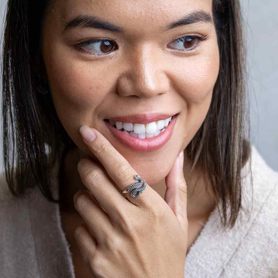 Woman wearing an octopus tentacle-shaped ring