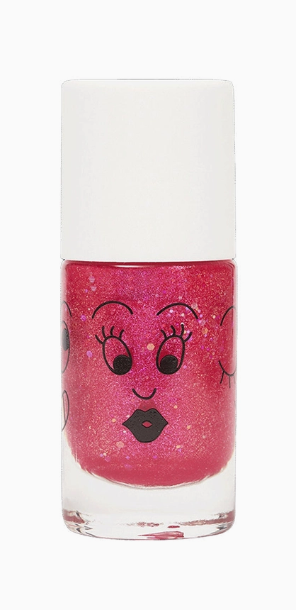 Nail polish bottle with a face design