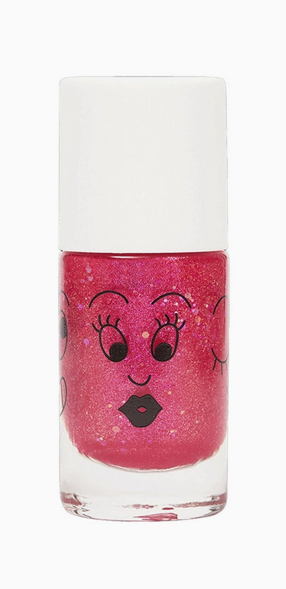Nail polish bottle with a face design