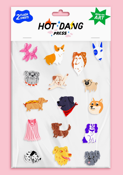 Pack of Hot Dang Press iron-on art with various dog illustrations on a pink background