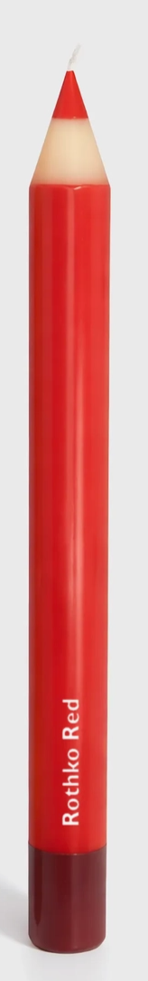 Red lip pencil candle with 'Rothko Red' label on a white background