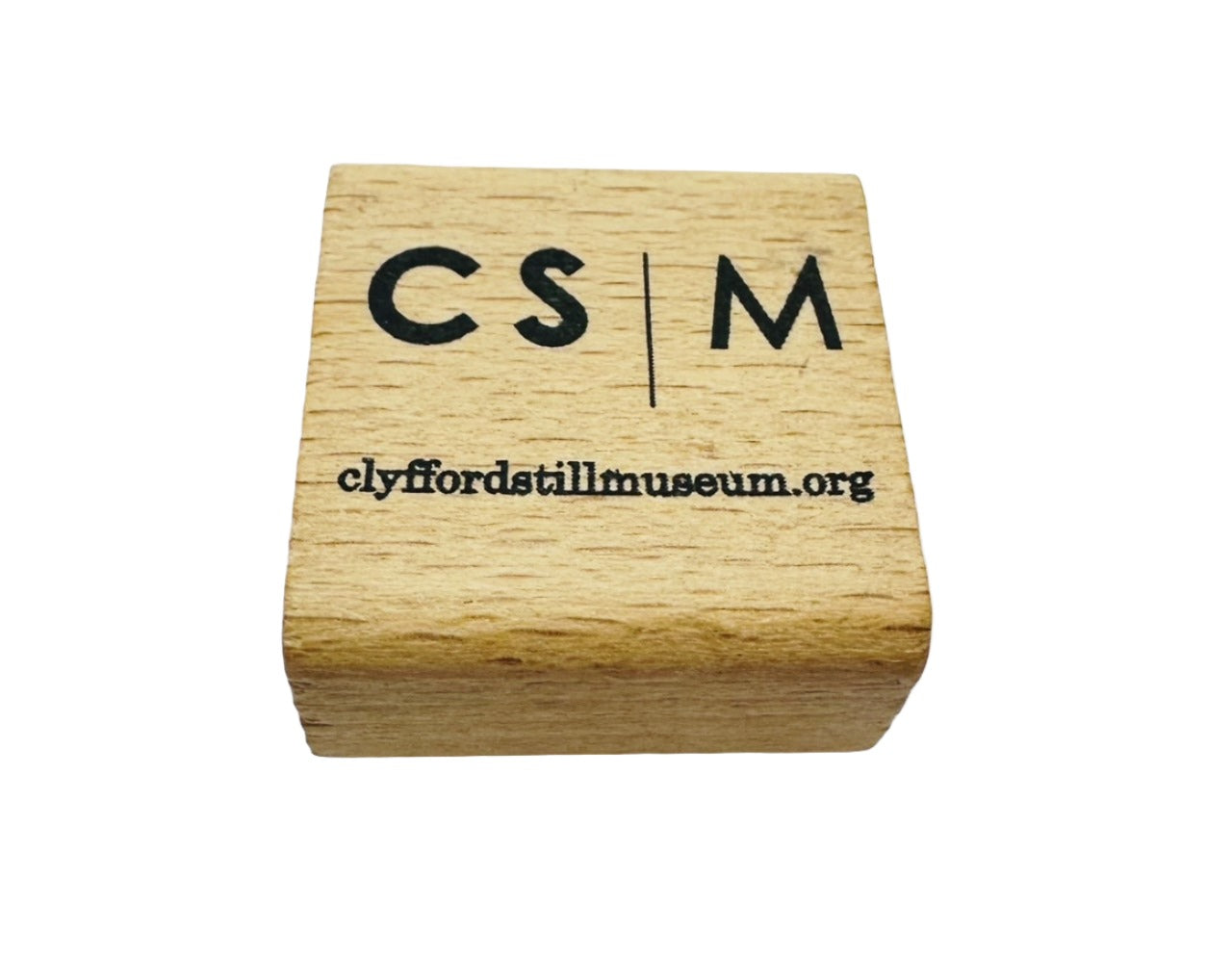 Top view of pencil sharpener with CSM logo