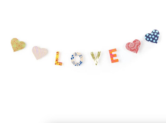 Multicolored/ textured Garland with hearts and letters spelling ‘LOVE’